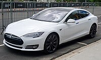 A front three-quarters view of a white 2015 Tesla Model S