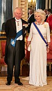 The (then) Prince of Wales and the (then) Duchess of Cornwall attending a state banquet at Buckingham Palace in London (3 June 2019)