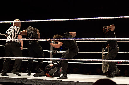 The Shield performing a beat down on Kane