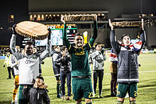 Ridgewell (right, wearing the British flag) celebrating the Timbers' victory over FC Dallas in the 2015 MLS Cup Playoffs. Timbers players after playoff game vs Dallas 2015.jpg