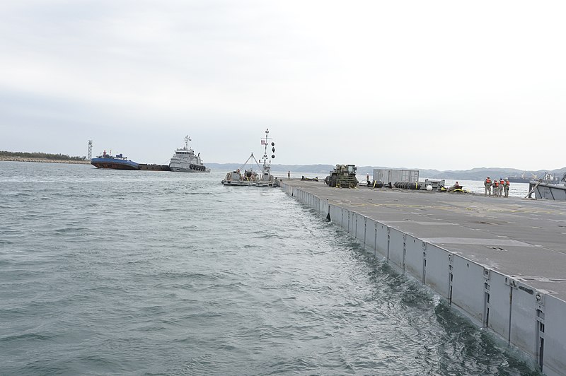 File:U.S. Soldiers with the 331st Transportation Company stand atop a section of the Trident Pier causeway as a boat pushes it through Pohang Harbor April 15, 2013, in Pohang, South Korea, during the Combined Joint 130415-N-LO372-256.jpg