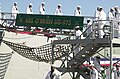 US Navy 040924-N-7949W-002 Crewmembers assigned to the Spruance-class destroyer USS O'Brien (DD 975) leave the ship for the final time.jpg