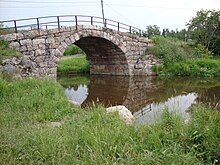 The old stone-made arch bridge over the Kerava River in Kerava, Finland Vanha kivisilta DSC08273 C.JPG