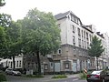 Apartment building in closed development in a corner, with a front garden facing Humboldtstrasse