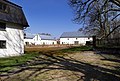 Individual monument belonging to the Stockhausen Manor: mansion, wall and stables as well as stairs to the farm yard and garden sculpture (see also material group - Obj. 09208017, same address)