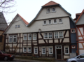 English: Half-timbered building in Alsfeld Kirchplatz 5 / Hesse / Germany This is a picture of the Hessian Kulturdenkmal (cultural monument) with the ID 13102 (Wikidata)