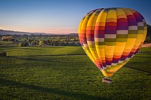 Hot air ballooning above vineyards is a popular attraction in Napa. Ballooning In Napa (129976155).jpeg