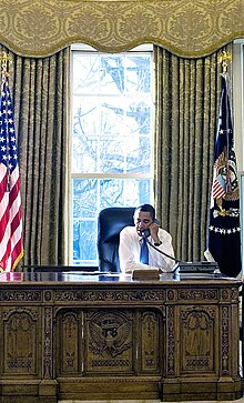 Barack Obama at his desk in the Oval Office of the White House, on Jan. 21, 2009. This was Obama's first full day as president. Barack Obama Day 1 in the Oval Office.jpg