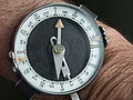 Soviet Army wrist compass with two (opposite) scales, 360 degrees clockwise and 6000 Soviet mil counterclockwise.