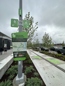 Signage near a completed portion of the Brickline Greenway along Market Street in 2023 Brickline Signage.png