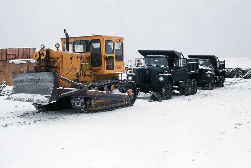 File:Bulldozer pulls two dump trucks, Alaska 1973.JPEG