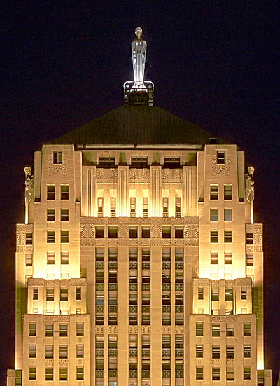 Night view of the top of The Chicago Board of Trade with the statue of Ceres clearly visible