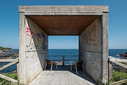 Chairs overlooking the ocean, Mundaka, Spain