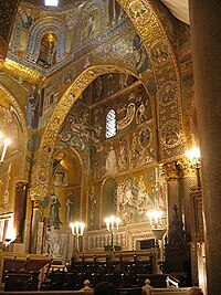 Fatimid arches and Byzantine mosaics complement each other within the Palatine Chapel. Chapelle Palatine.jpg