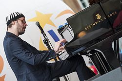 David Helbock on piano during an open-air concert in The Old Town's Square in Warsaw, Poland on 16 July 2016 DavidHelbock20160716a.jpg