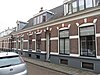 Onderdeel van een bouwblok van drie woningen