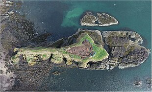 Aerial photo of fort excavation (north is to the top right) Dunnicaer hill fort excavated 2015.jpg