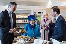 Queen Elizabeth II at the opening of an office declared the "most environmentally-friendly building in the world", November 2013 Elizabeth II at an office opening.jpg
