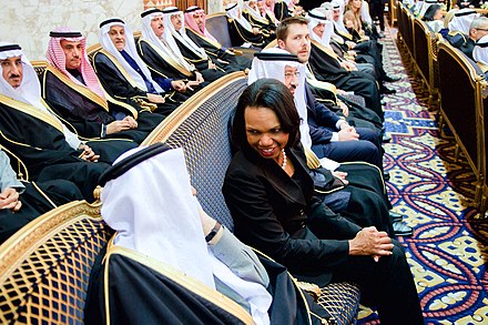 Rice chats with a member of the Saudi Royal Family after welcoming the new king Salman of Saudi Arabia, January 27, 2015