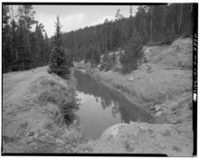 The Grand Ditch, one of the earliest water diversions of the Colorado River, is still in use today. GRAND DITCH OVERVIEW, VIEWING SOUTH - Grand Ditch, Baker Creek to LaPoudre Pass Creek, Grand Lake, Grand County, CO HAER COLO,25-GRLK.V,2-1.tif