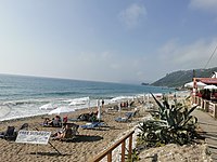 Agios Gordios (beach strip with deckchairs free of charge for restaurant guests of "AlcBar")