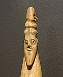 Carved head of bearded man with torus-like headgear, reminiscent of the Mesopotamian king. Late Naqada I- Early Naqada II 3800-3400 BCE, Brooklyn Museum.[27]