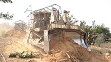 Armored IDF D9 bulldozers creating a road in the Gaza Strip - October 2023 IDF D9R bulldozer - Swords of Iron - 2023-10-31.jpg