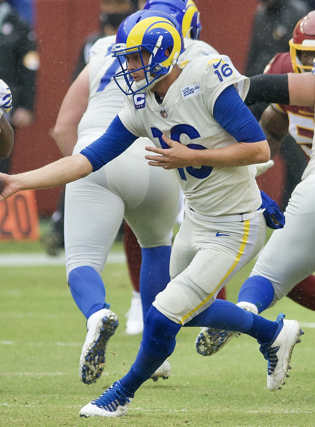 INGLEWOOD, CA - JANUARY 01: Los Angeles Rams quarterback Matthew Stafford (9)  talks wtih Los Angeles Chargers quarterback Justin Herbert (10) after the  game on January 1, 2023, at SoFi Stadium in