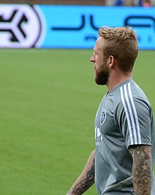 Johnny Russell warming up. Johnny Russell Warming Up (cropped).jpg