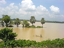 Many areas remain flooded during the heavy rains brought by monsoon in West Bengal Kalinagar Floods B.JPG