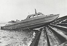 This boat, an early example from the Eureka Tug-Boat Company, was the progenitor of thousands of Second World War landing craft. LCPL on Seawall.jpg