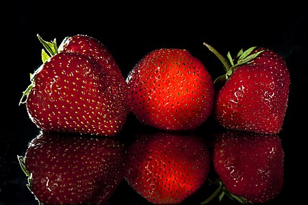 The strawberry in the center was illuminated from the inside using a fiber optic cable