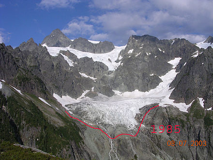 Lower Curtis Glacier in 2003 compared to 1985 extent demarcated by red line demonstrates the retreat of this glacier.
