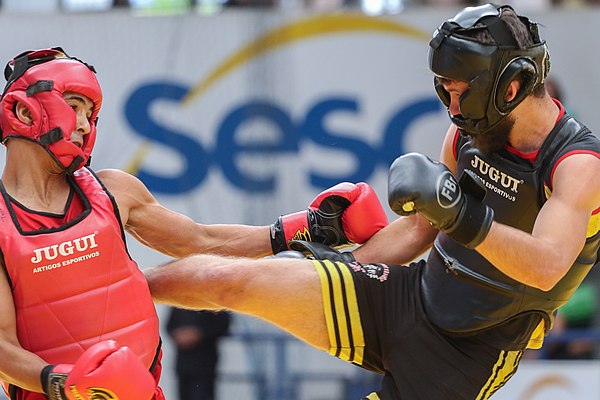 Two Brazilian fighters in a Sanda/Sanshou match. Sanda is a modernized form of Kung Fu and one of the two disciplines of Sport Wushu