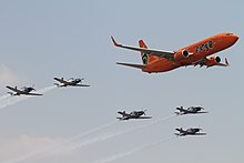 Mango airlines 737 in formation with the Silver Falcons.JPG