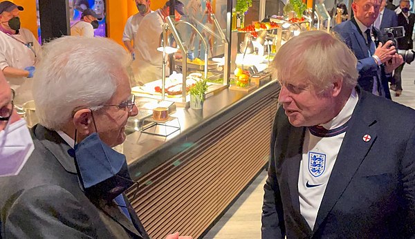 Italian President Sergio Mattarella speaks with the UK Prime Minister Boris Johnson before the final