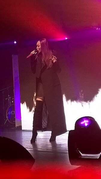 Monica performing in 2014