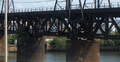 Schuylkill Arsenal Railroad Bridge, built about 1905 by the Pennsylvania Railroad as a formerly electrified, two track, deck truss, (fixed shut) swing bridge across the Schuylkill River in the University City neighborhood in Philadelphia, Pennsylvania. Now owned by CSX Transportation.