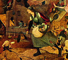 Détail du tableau Margot la Folle de Pieter Brueghel l'ancien représentant Margot la Folle vêtue d'une armure et brandissant une épée.