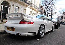 Rear view Porsche GT2 white (6906402955).jpg