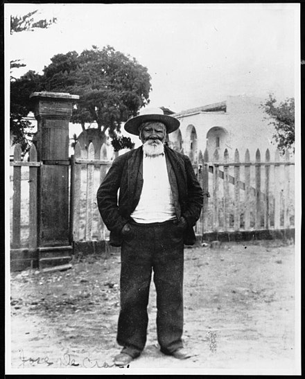 Portrait of José de Grácia Cruz, a craftsman and bell ringer at Mission San Juan Capistrano (ca. June 1909). Source: University of Southern California. Libraries and California Historical Society.