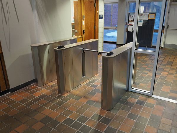 Drop Arm Optical Turnstiles Manufactured by Q-Lane Turnstiles LLc