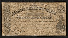 25-cent bill inscribed "THIS CERTIFIES THAT THERE HAS BEEN DEPOSITED IN THE MACON SAVINGS BANK IN CONFEDERATE TREASURY NOTES TWENTY FIVE CENTS. Payable to the Holder with FOUR PER CENT INTEREST. after thirty days notice in Confederate Treasury Notes when presented in sums of FIVE DOLLARS MACON, GA. March 16. 1863.