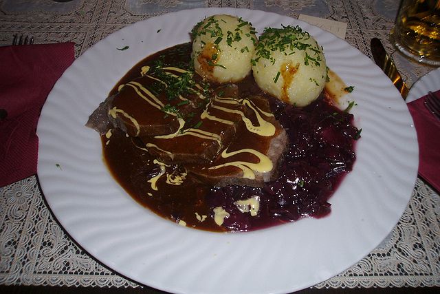 Sauerbraten served with Kartoffelklöße (potato dumplings)