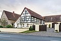 Stable house (pull-out house) of a three-sided courtyard