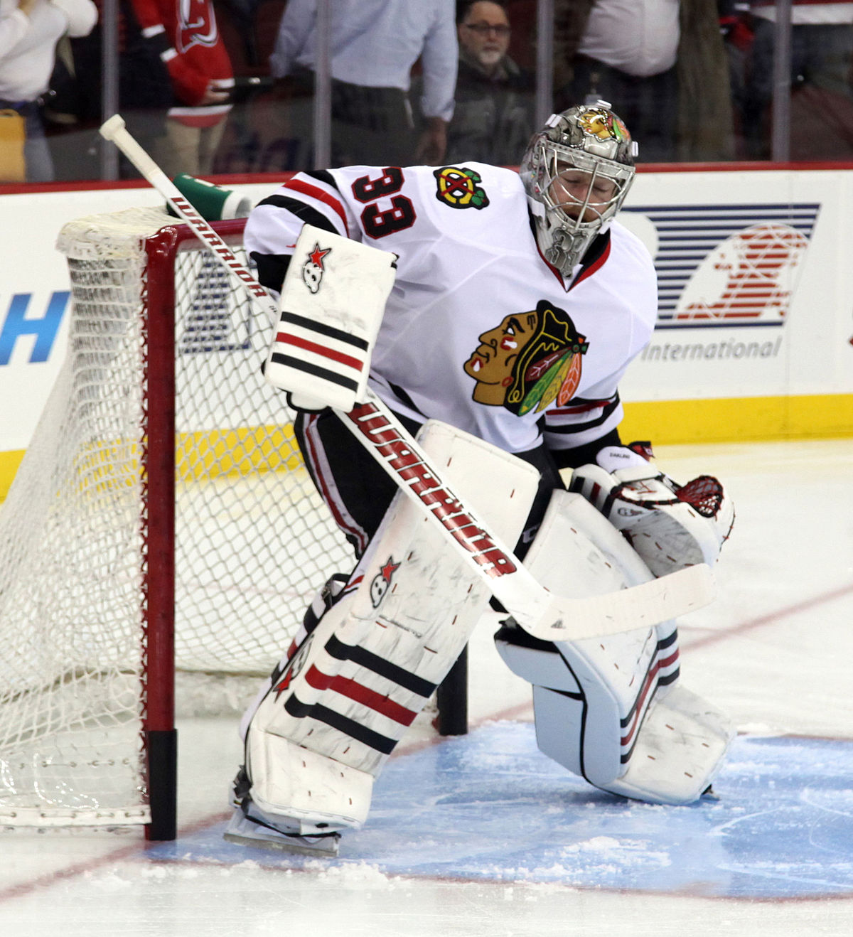 Blackhawks goalie has 'Wayne's World' pics on mask