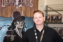 The cover art inspired Shane Lacy Hensley to write the game Deadlands. Shane Lacy Hensley.JPG