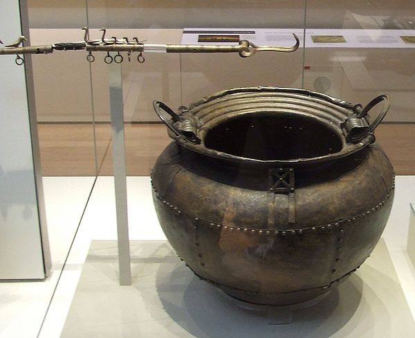 A Bronze Age cauldron, and flesh-hook, made from sheet bronze