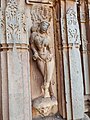 Salabhanjika style statues adoring the outside wall of the temple.