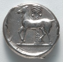 A Carthaginian coin from Sicily depicting a horse in front of a palm tree (called "Phoinix" in Greek), 4th century BC Sicily, Greece, 4th century BC - Tetradrachm- Persephone (reverse) - 1917.980.b - Cleveland Museum of Art.tif